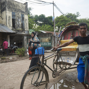 Richaws acros from a policestation, Koral Slum, Dhaka