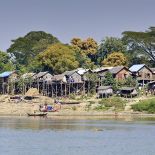 Village on stilts is common along Irrawaddy as monsoon brings high tide